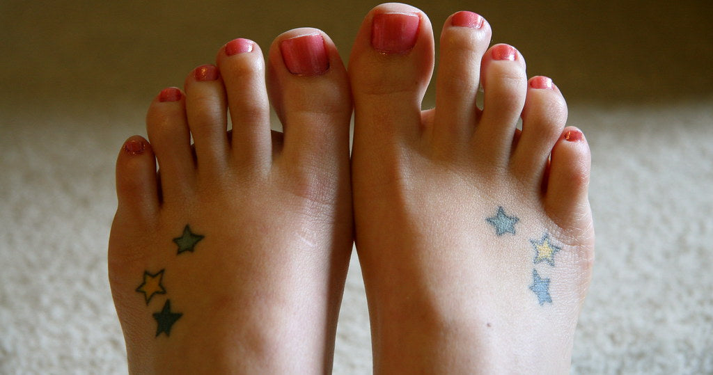 Best nail polish for long wear UK - swatches of long-lasting nail polish colours on hand