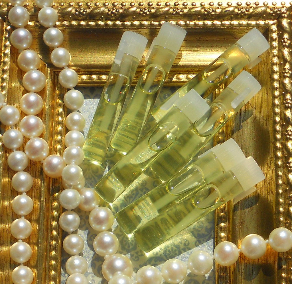 Woman applying face serum correctly with fingertips on clean skin