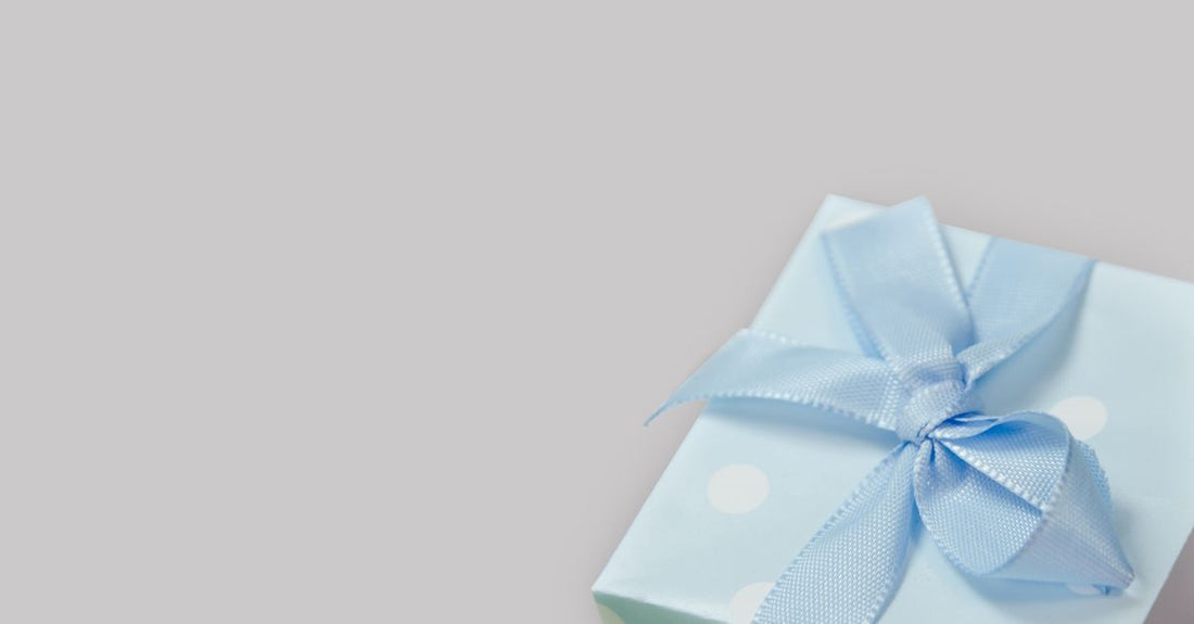 Extra large waterproof satin-lined shower cap for long hair on a bathroom shelf