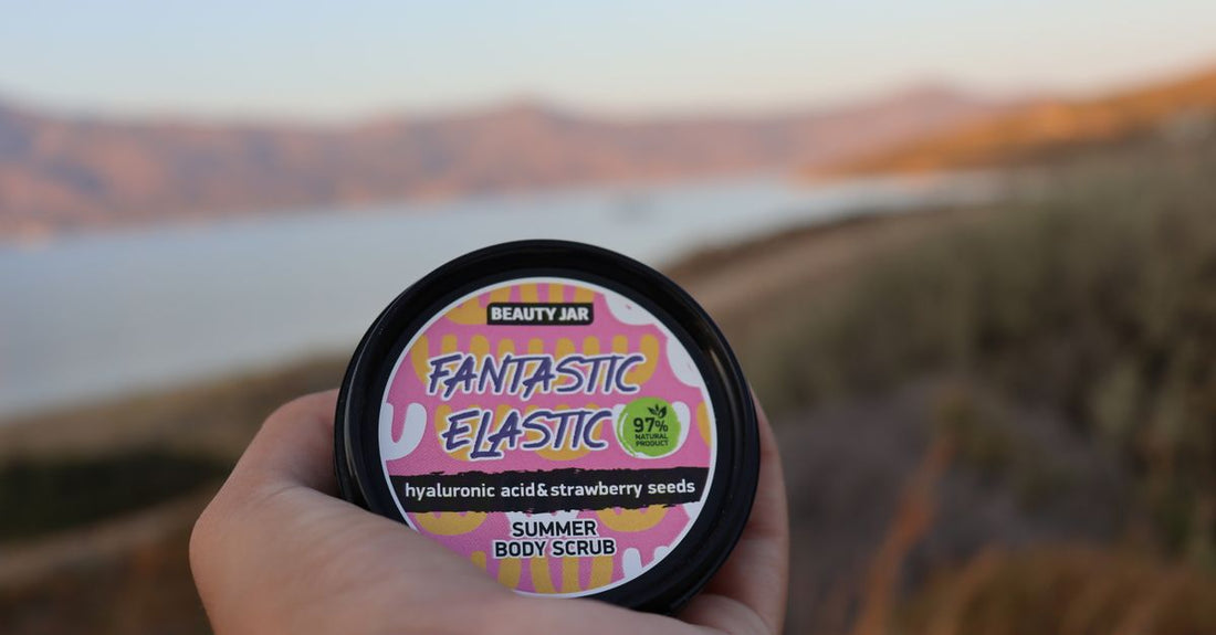 Best face scrub for sensitive skin UK: gentle exfoliating powder in a glass jar on a clean bathroom shelf.
