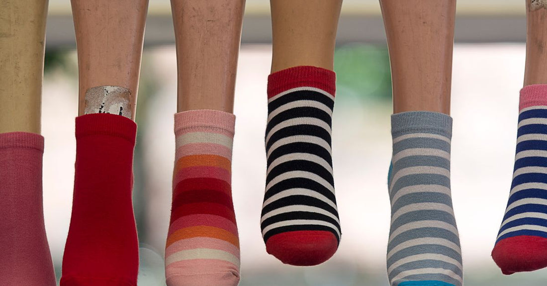 A pair of moisturizing gel socks resting on a clean surface, representing the best moisturizing socks UK 2026 for dry skin relief.