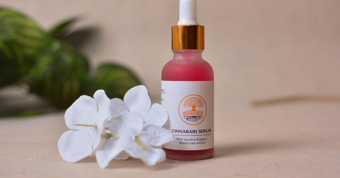 Froya Organics anti-ageing serum bottle on a light marble surface with natural botanicals.