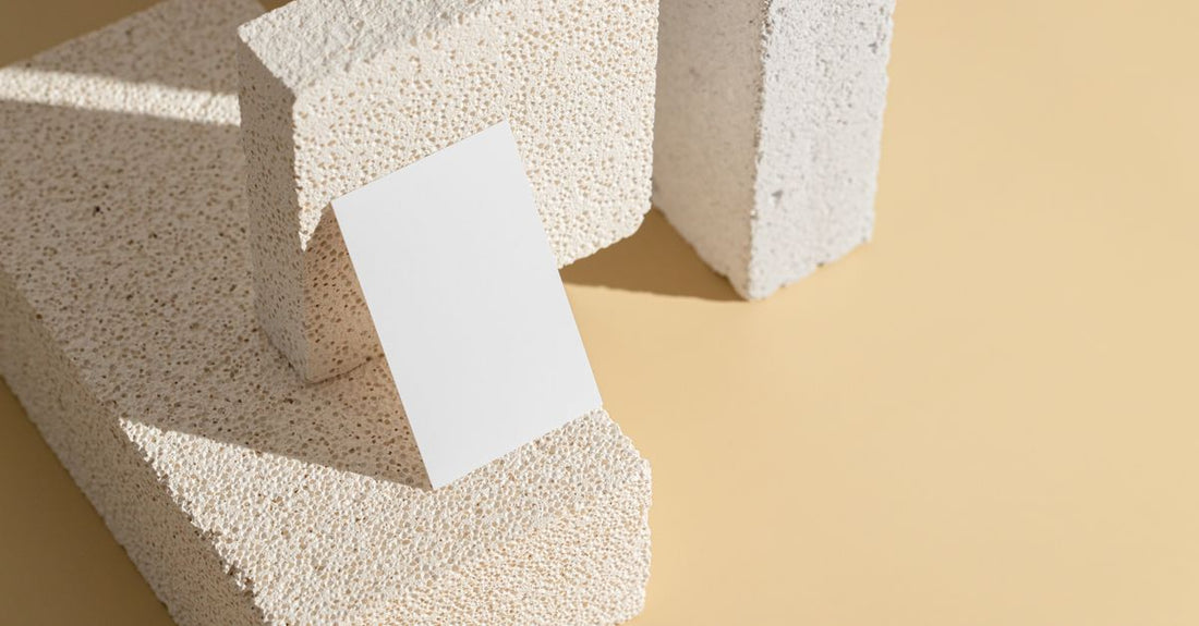 A close-up of a translucent natural alum block on a bathroom shelf, illustrating an alum buying guide for UK shoppers.