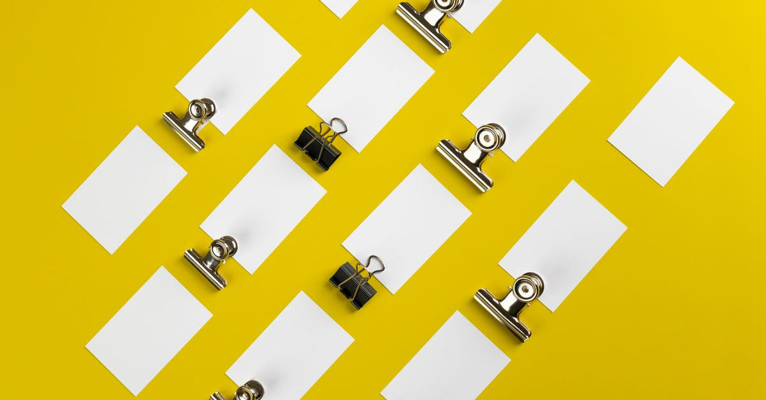Assorted hair clips displayed on a marble surface, illustrating a clips buying guide for damage-free styling