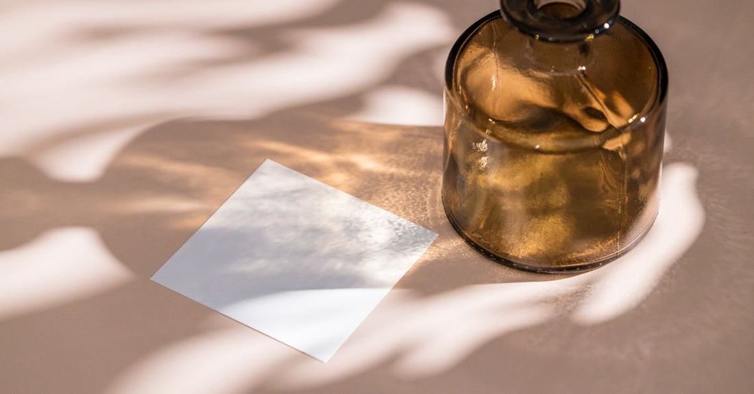 A sleek white tube of eyelash primer on a clean background, illustrating how to choose eyelash primers for UK shoppers.