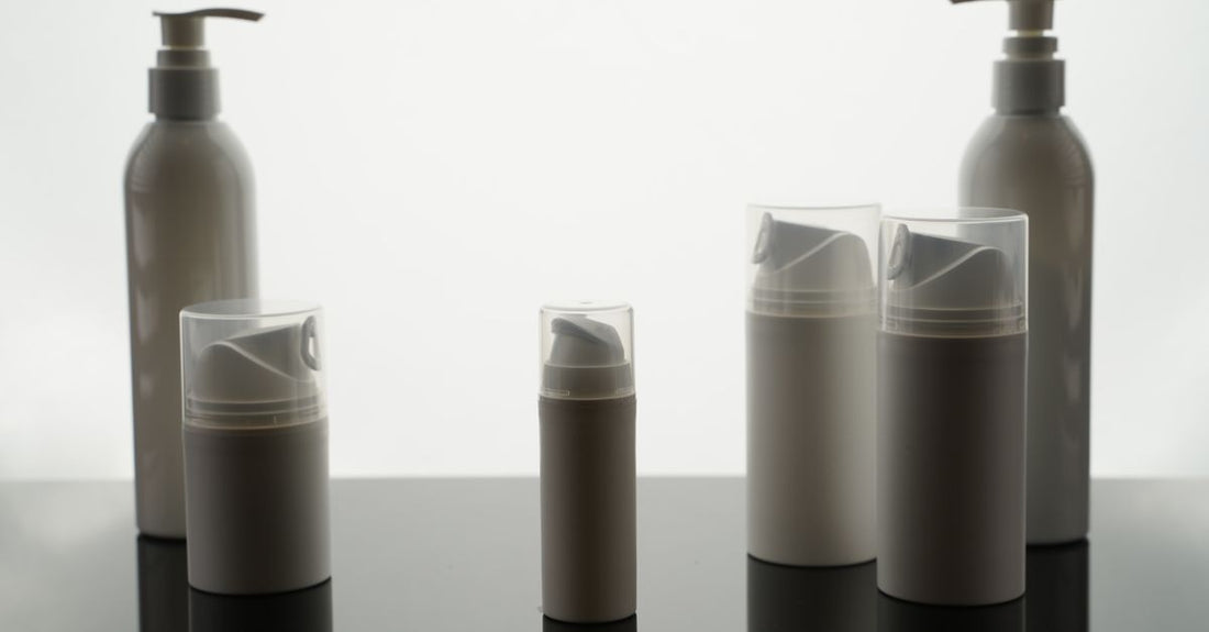 Tanning oils and lotions buying guide UK featuring various bottles of tanning accelerators and bronzers.