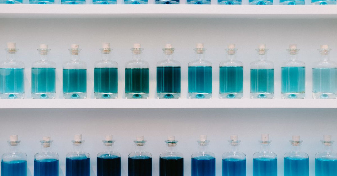 A collection of mouthwash bottles on a bathroom shelf, helping you follow a mouthwash buying guide UK.