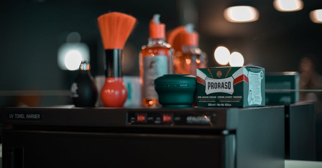 A close-up flatlay of razor cartridges with lubrication strips and multiple blades, illustrating how to choose cartridges for a smooth shave.