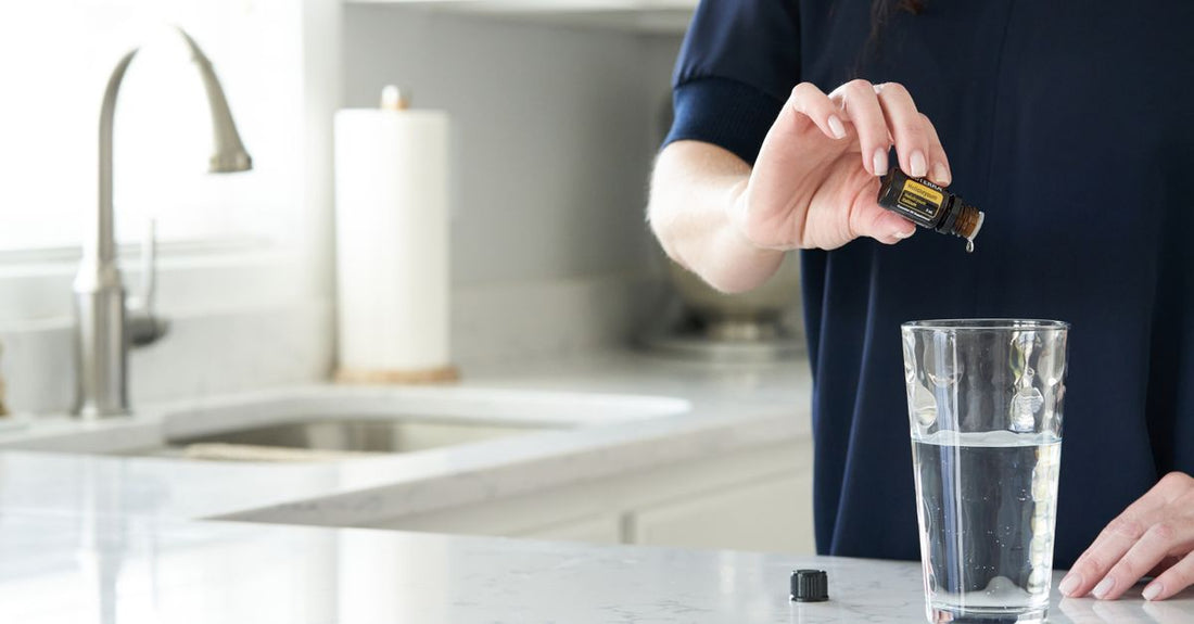 A selection of the best hair treatment oils 2026 in glass bottles on a white marble surface.