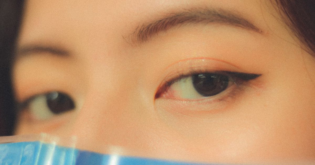 Assorted eyebrow colour products swatched on a neutral background for an eyebrow color buying guide