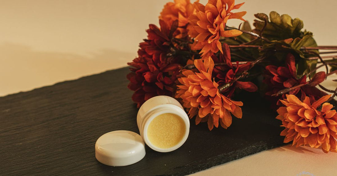 A selection of aftercare products including a soothing recovery balm, piercing mist, and complete aftercare kit arranged on a clean surface.