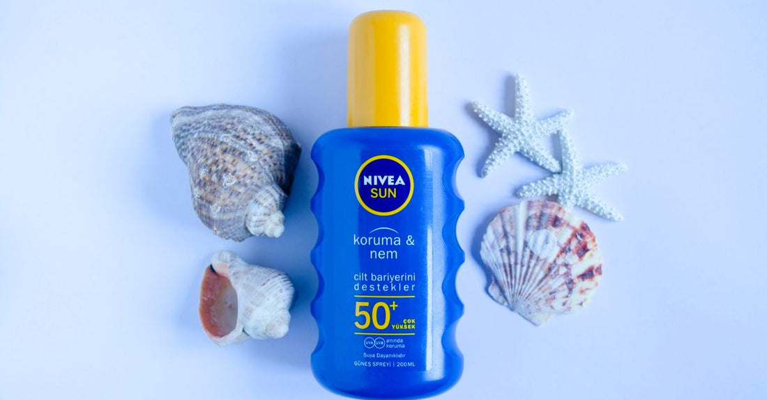 Collection of sunscreen bottles for face on a white surface, representing the best sunscreen for face UK options.