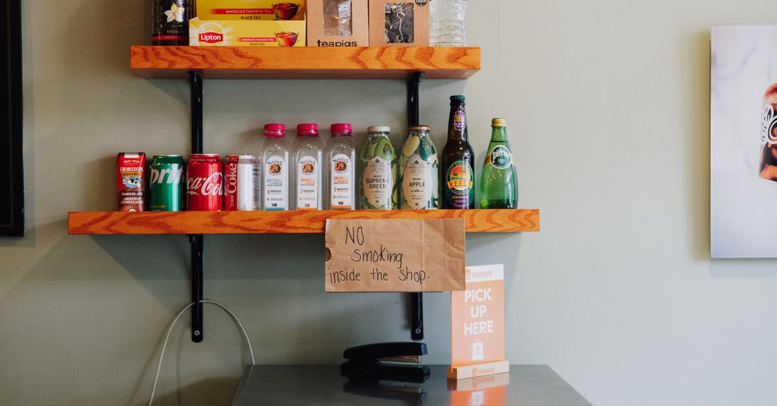 Collection of toner and astringent bottles on a bathroom shelf, illustrating how to choose toners & astringents UK