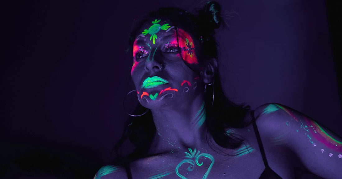 A professional neon body paint palette with vivid colours, representing the best body paint 2026 for flawless festival looks.