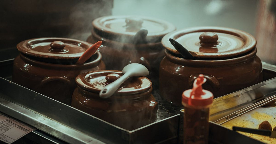 A pot of matte hair styling clay on a neutral background, illustrating how to choose clays for value and performance.