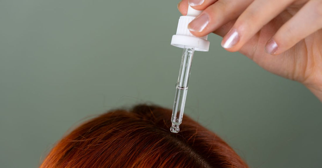 Scalp treatment bottle on a clean bathroom shelf, illustrating how to use scalp treatment for dandruff correctly