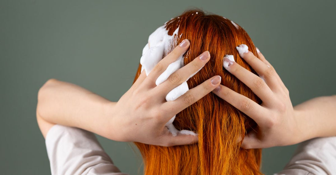 Row of shampoo bottles for oily scalp on a bathroom shelf, best UK options 2026