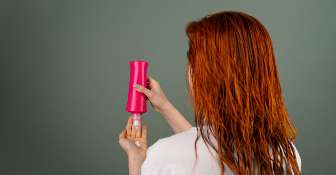 Leave in conditioner bottle on a bathroom shelf, illustrating how to use leave in conditioner correctly for UK hair types.