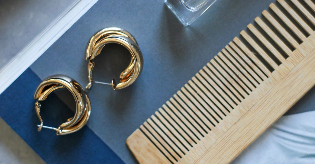 A handcrafted wooden beard and moustache comb resting on a neutral background, demonstrating how to choose beard & mustache combs for daily grooming.