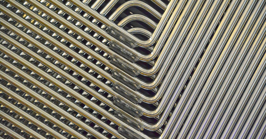 A set of stainless steel nail clippers displayed on a clean surface, illustrating a nail clippers buying guide.