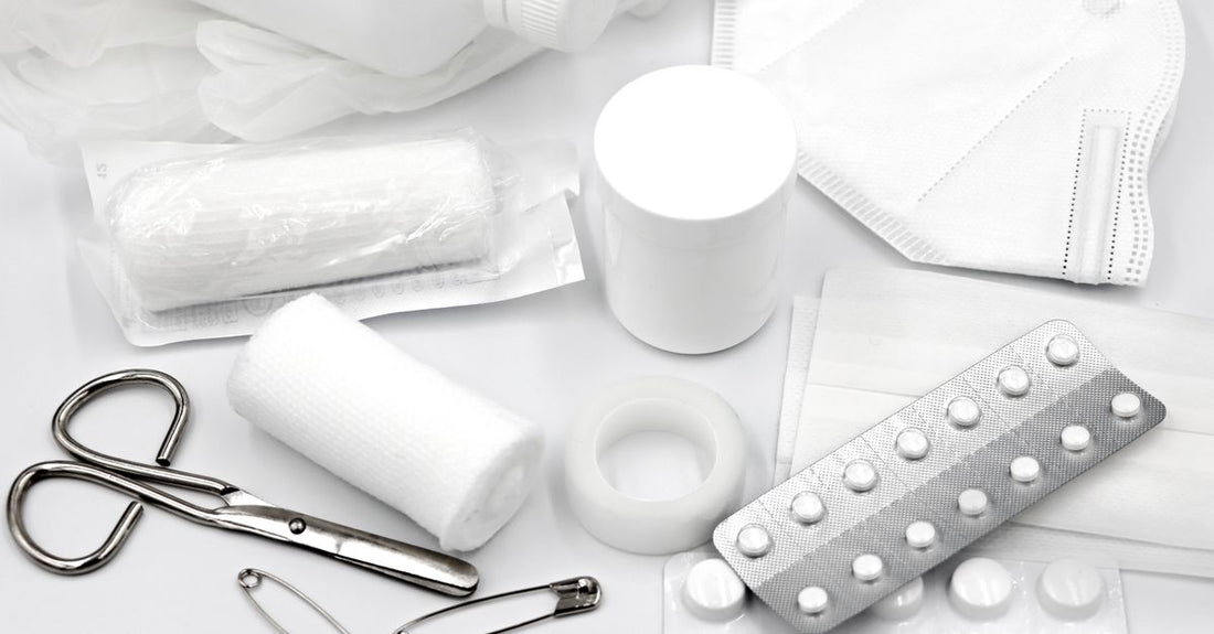 A selection of ointment jars and tubes on a white background, illustrating how to choose ointments UK for different skin needs.