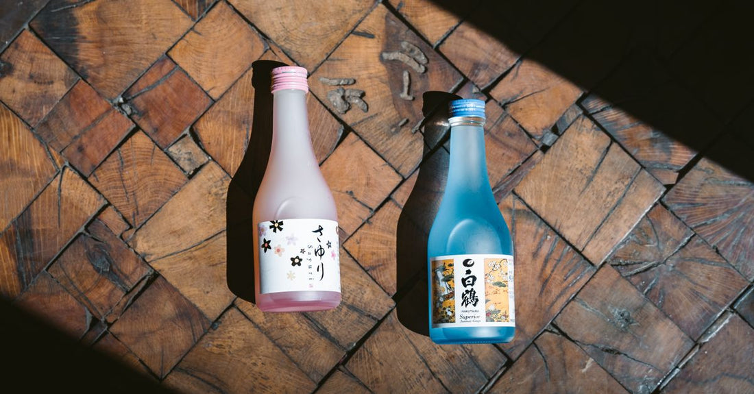 A flatlay of luxury body wash bottles on a clean surface, illustrating a body washes buying guide for UK gift shoppers.