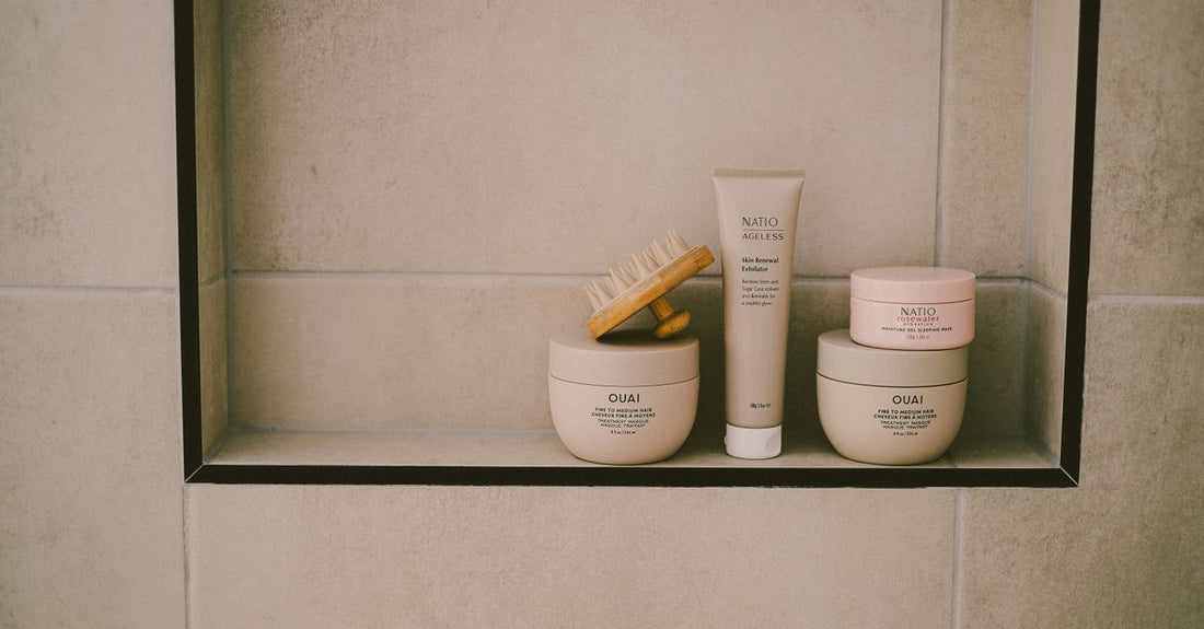A row of hair mask jars on a sunlit bathroom shelf, illustrating how to choose hair masks UK for summer 2026
