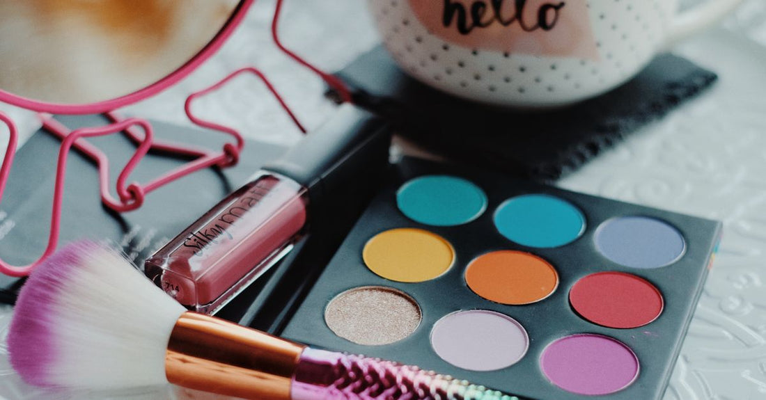 A flatlay of professional eyeshadow brushes on a white background, showcasing the best eyeshadow brushes UK 2026.