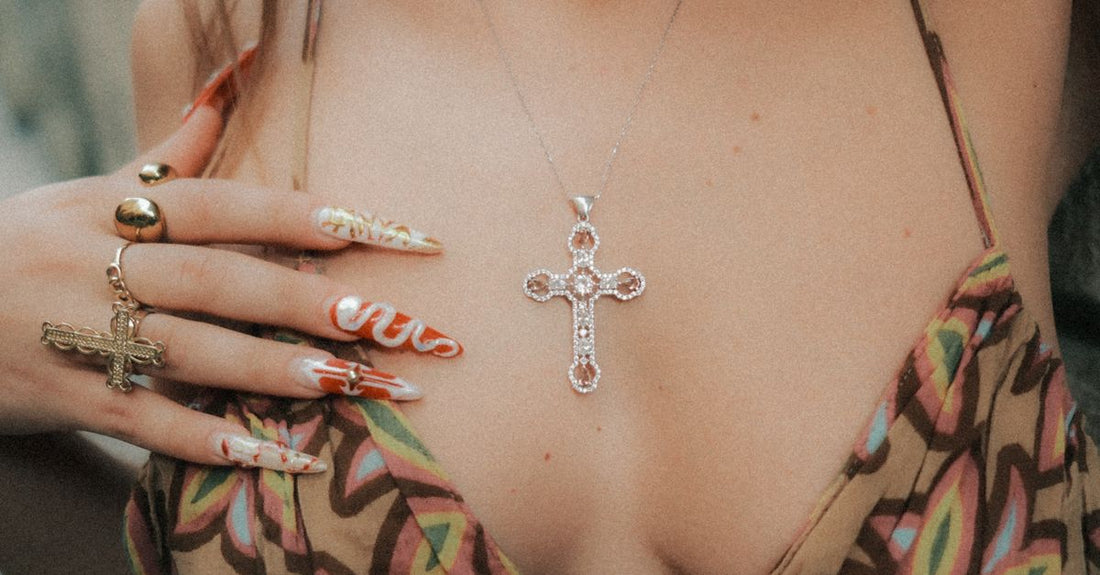A selection of false nails and accessories laid out on a clean surface, illustrating how to choose false nails & accessories for a perfect at-home manicure.