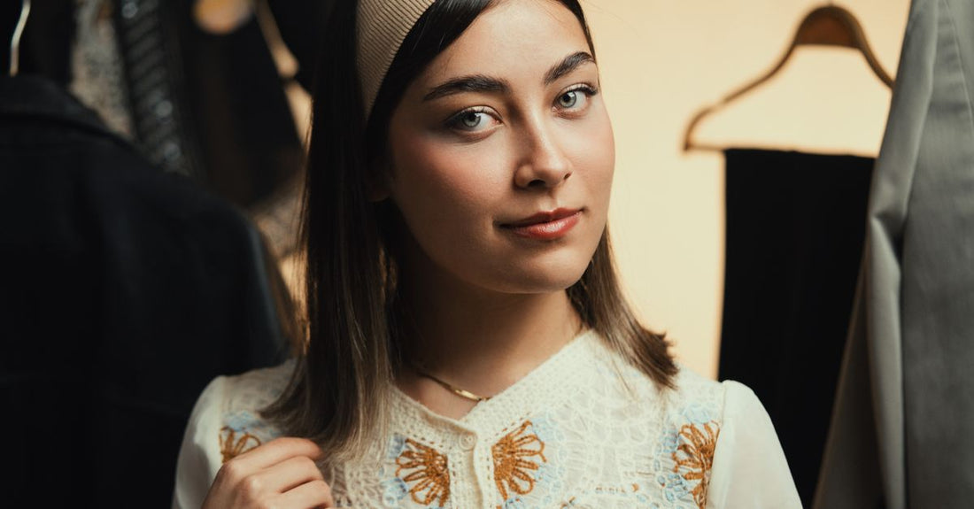 A collection of various headbands in a flatlay, showing different widths, materials and colours for a headbands buying guide.