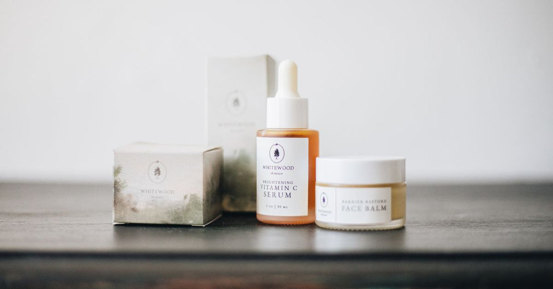 A collection of skincare balm jars arranged on a marble surface, representing the best balms UK 2026.