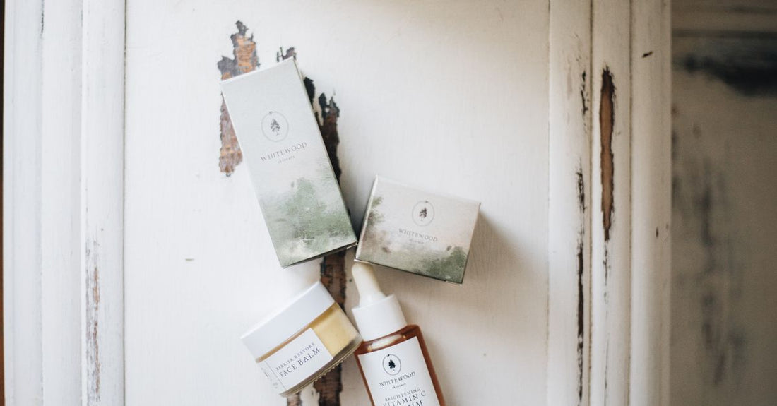 Flatlay of skincare products including cleanser, moisturiser, and serum, illustrating how to choose face UK safely