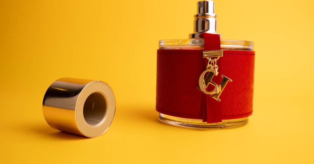 A selection of cologne bottles on a marble surface, illustrating how to choose cologne for beginners