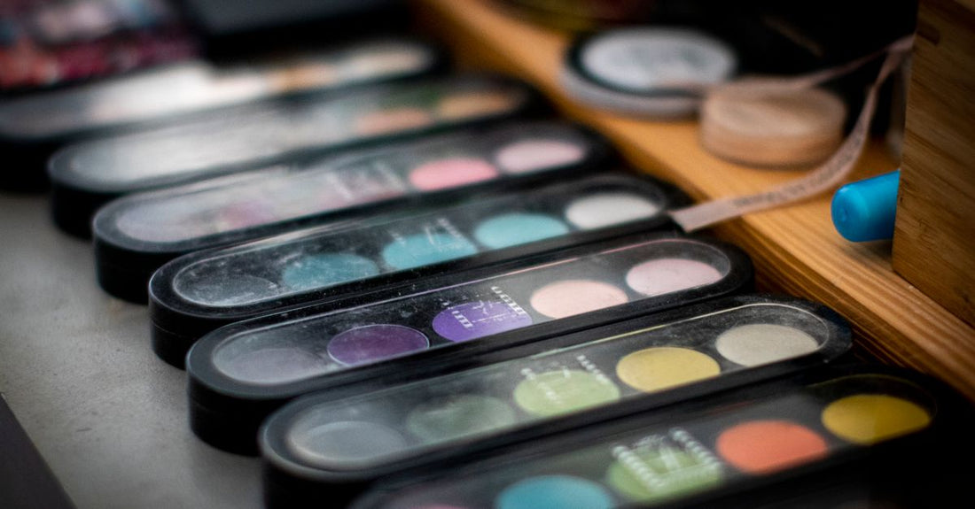 Professional cosmetic case with multiple compartments and organised makeup products