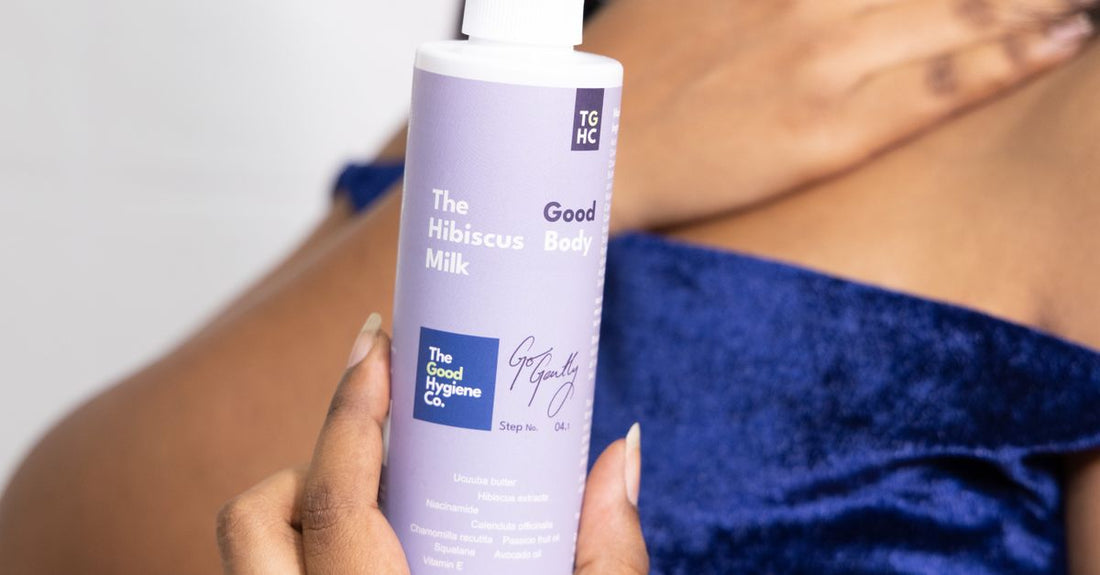 A row of body care bottles on a marble surface, illustrating the best body 2026 routine for dry skin relief