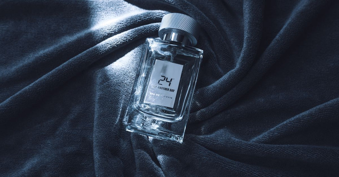 Two glass eau de parfum bottles on a marble surface, part of our eau de parfum buying guide for UK gift shoppers.