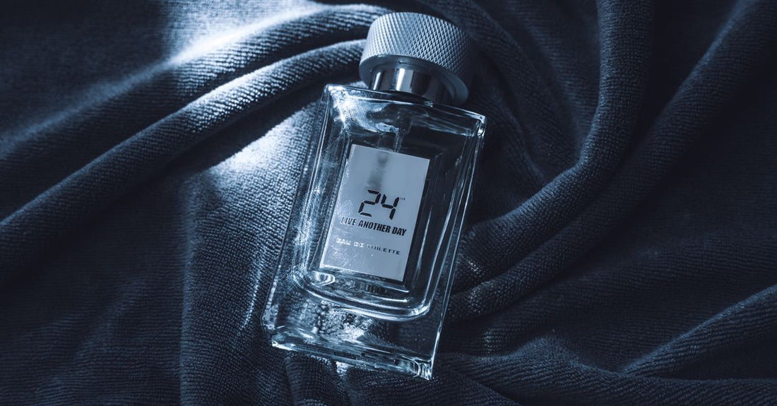 Selection of eau de parfum bottles on a neutral flatlay surface, representing the best eau de parfum 2026 choices.