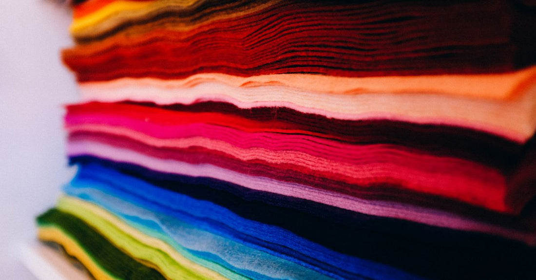 A flatlay of colourful fabric headbands in various styles, illustrating the headbands buying guide for UK shoppers.