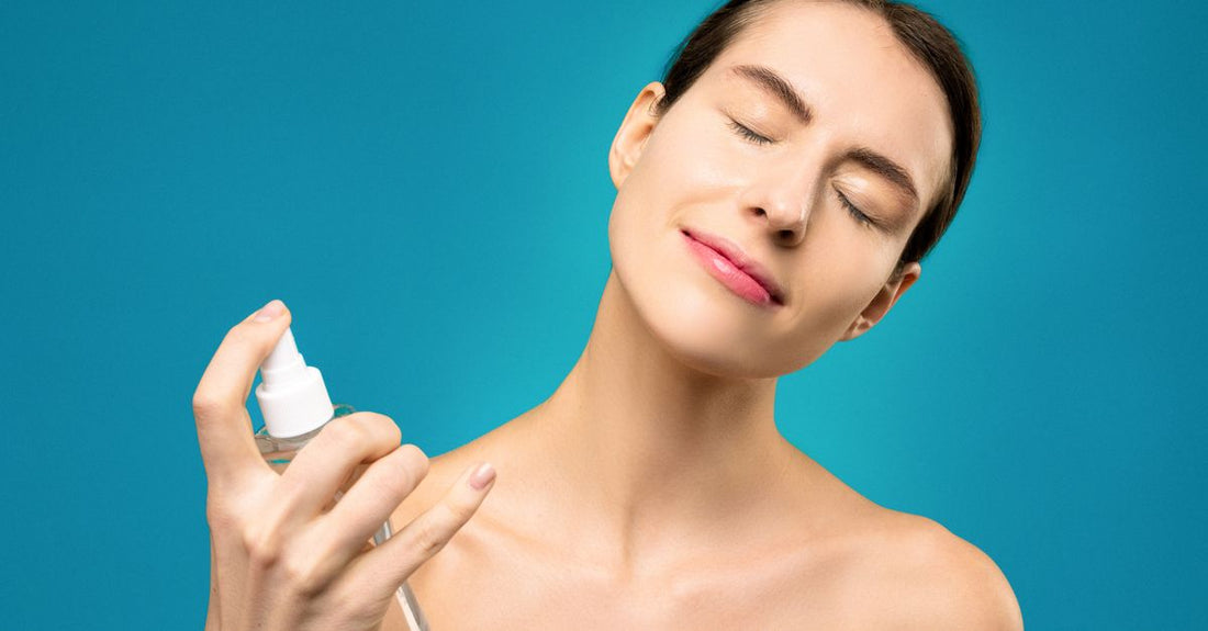 A hair mist for fragrance bottle on a dressing table, illustrating how to use hair mist for fragrance.