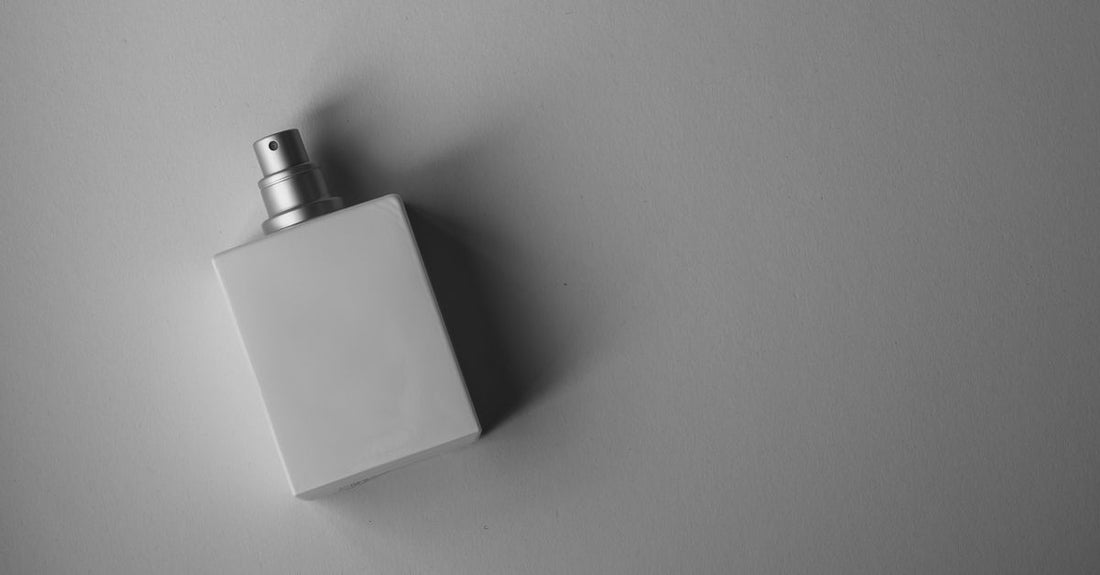 Body spray bottle on a dressing table, showing how to use body spray as perfume
