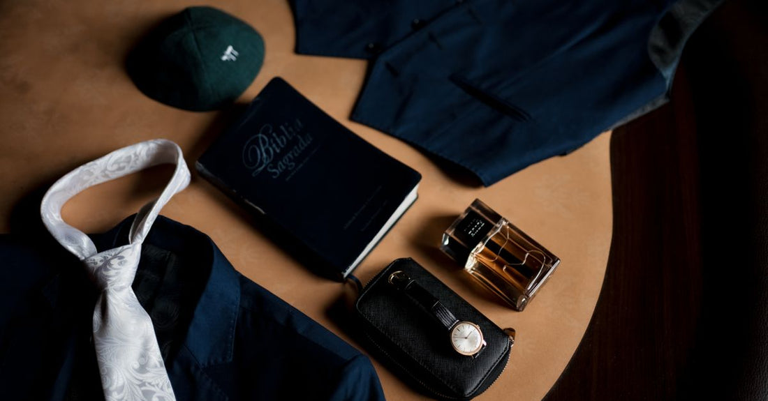 A sleek designer cologne bottle on a cool marble surface, illustrating a cologne buying guide for long-lasting men's fragrance.