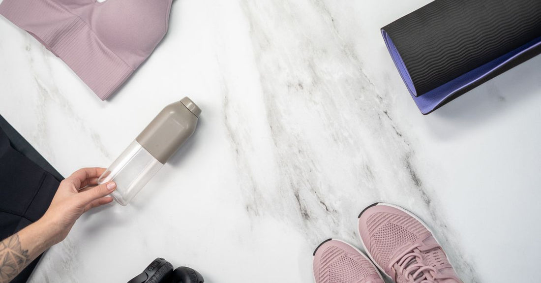 Hair mousse bottle on a bathroom shelf, illustrating how to use hair mousse for volume