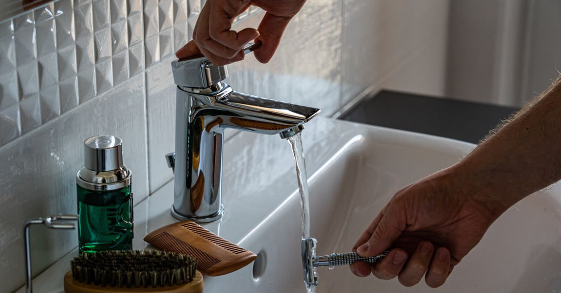 Best cleaners 2026: shaver cleaning solution bottle on a bathroom shelf, showing refill cartridge compatibility.