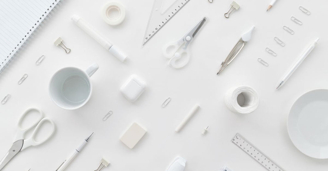Three white jars of the best balms and moisturizers 2026 lined up on a bright, clean surface, representing a simple beginner skincare routine.