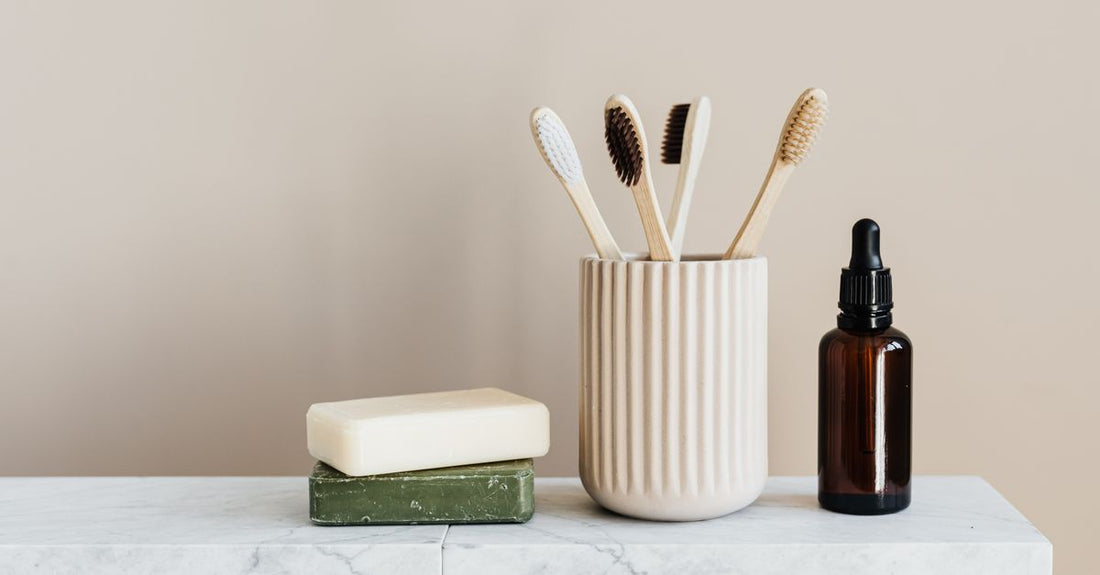 A row of best beard conditioners & oils 2026 bottles on a white marble surface with a soft shadow.