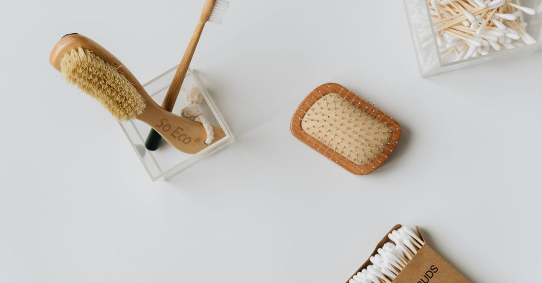 A flatlay of a professional makeup brush set with bamboo handles and rose gold ferrules, showcasing the best brush sets 2026 for UK beauty enthusiasts.