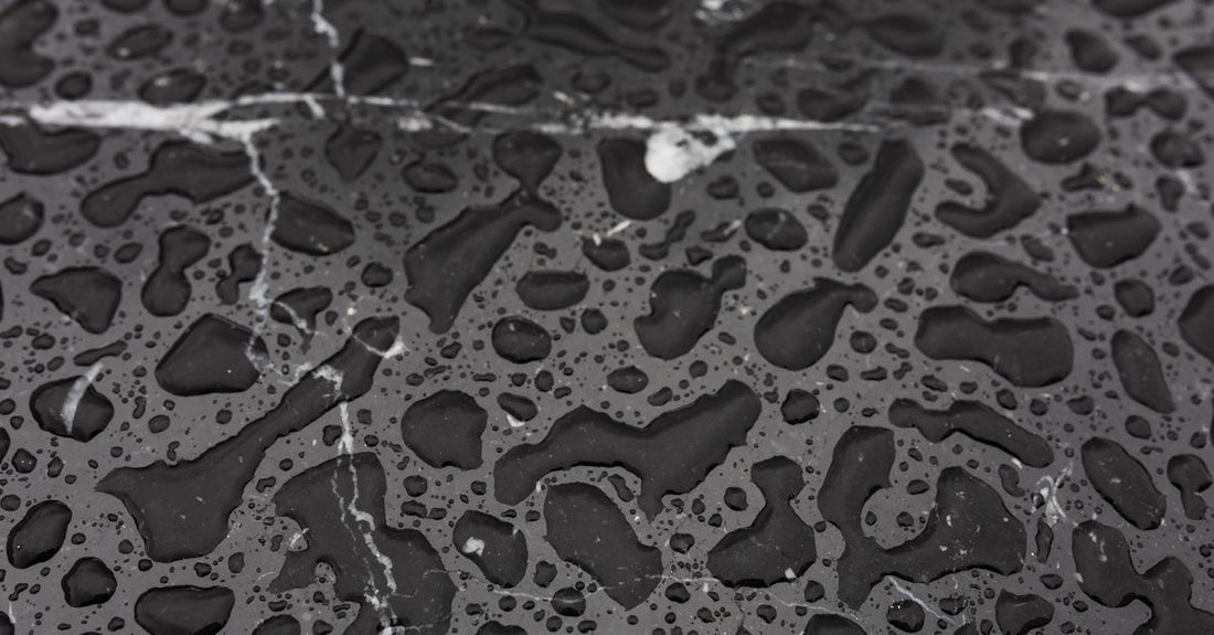 How to choose antiperspirant deodorant: a sleek deodorant stick on a marble surface.