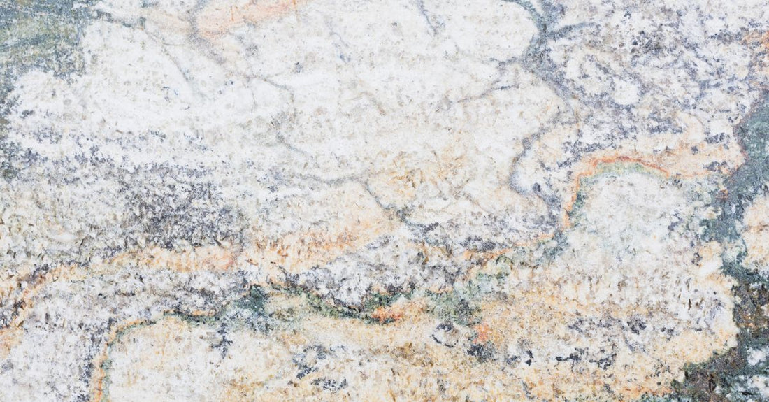 A selection of moisturiser jars and bottles on a marble surface, illustrating our creams buying guide for UK shoppers.