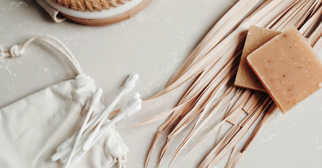 Natural bamboo cotton swabs arranged on a marble surface, showcasing the best cotton swabs 2026 for eco-friendly beauty routines.