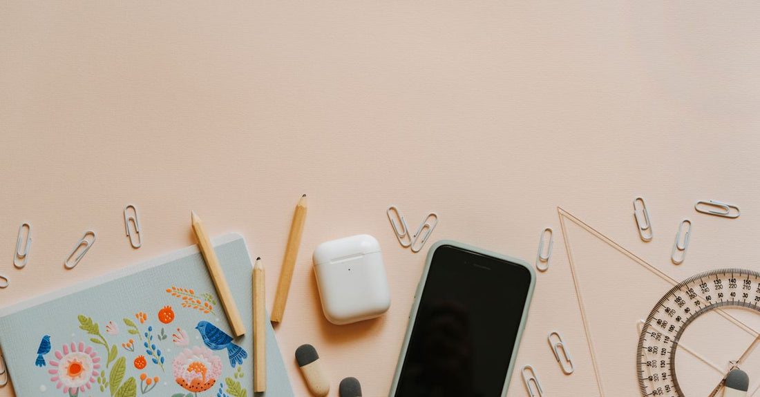 A flatlay of essential makeup brush sets on a marble surface, illustrating a brush sets buying guide for UK shoppers.